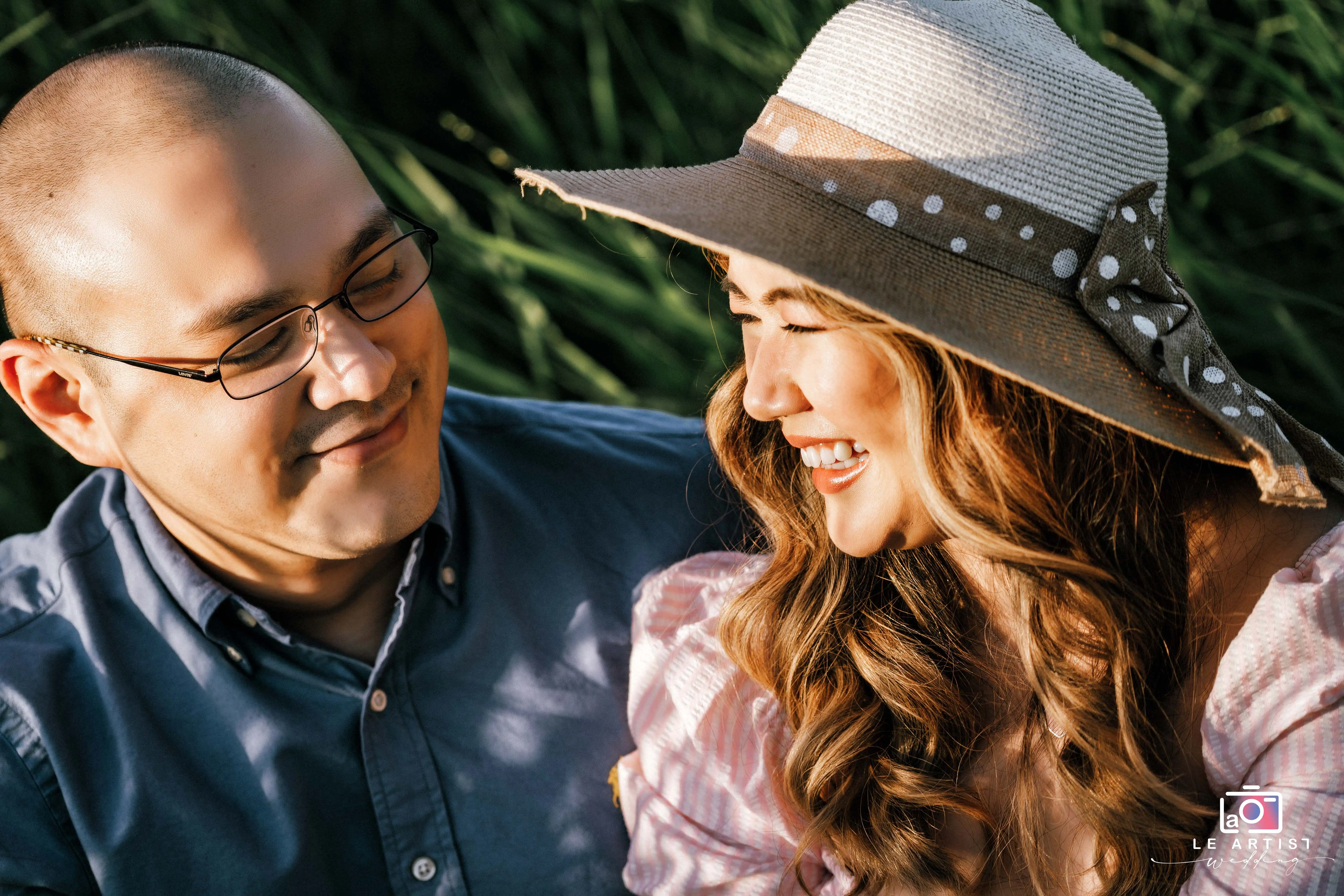 A joyful outdoor moment captured, filled with smiles and sunshine, perfect for a wedding gallery. Le Artist Wedding